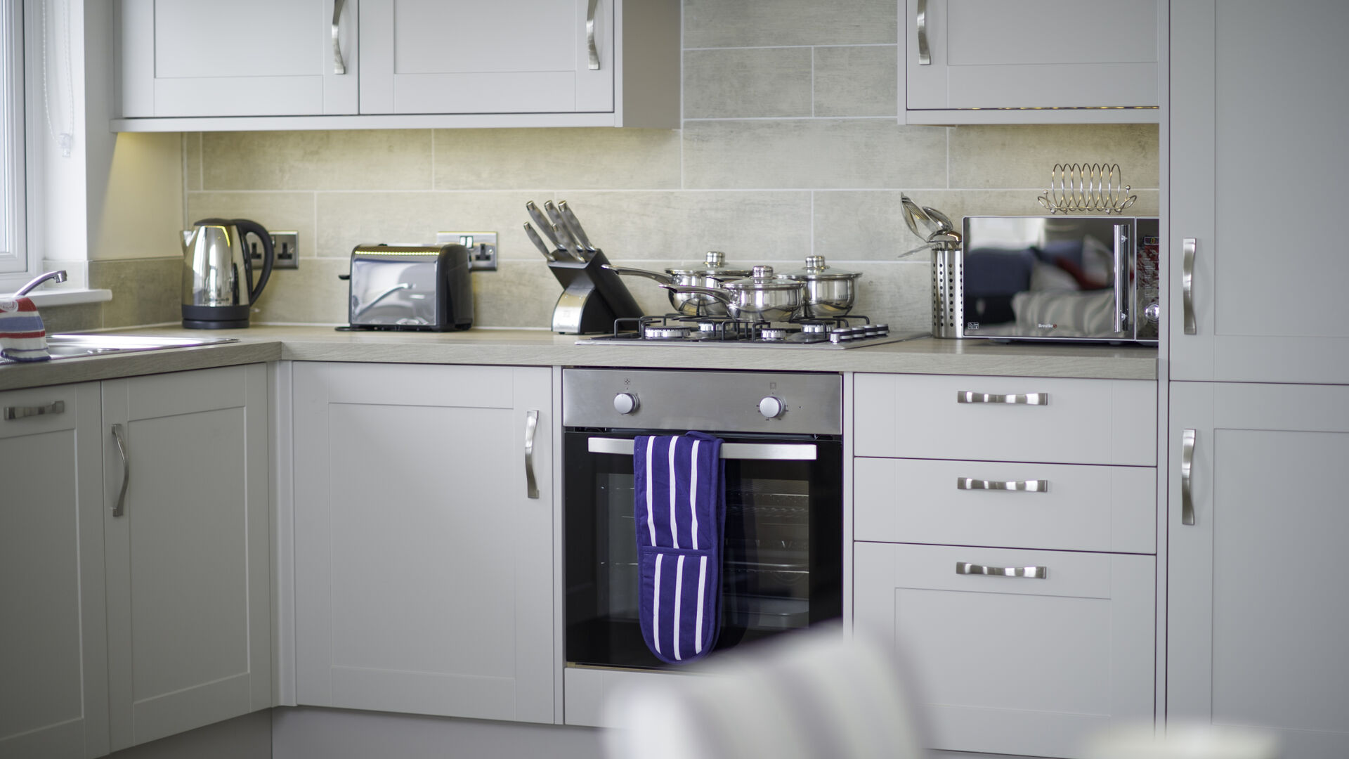 the kitchen at the waterfront apartment