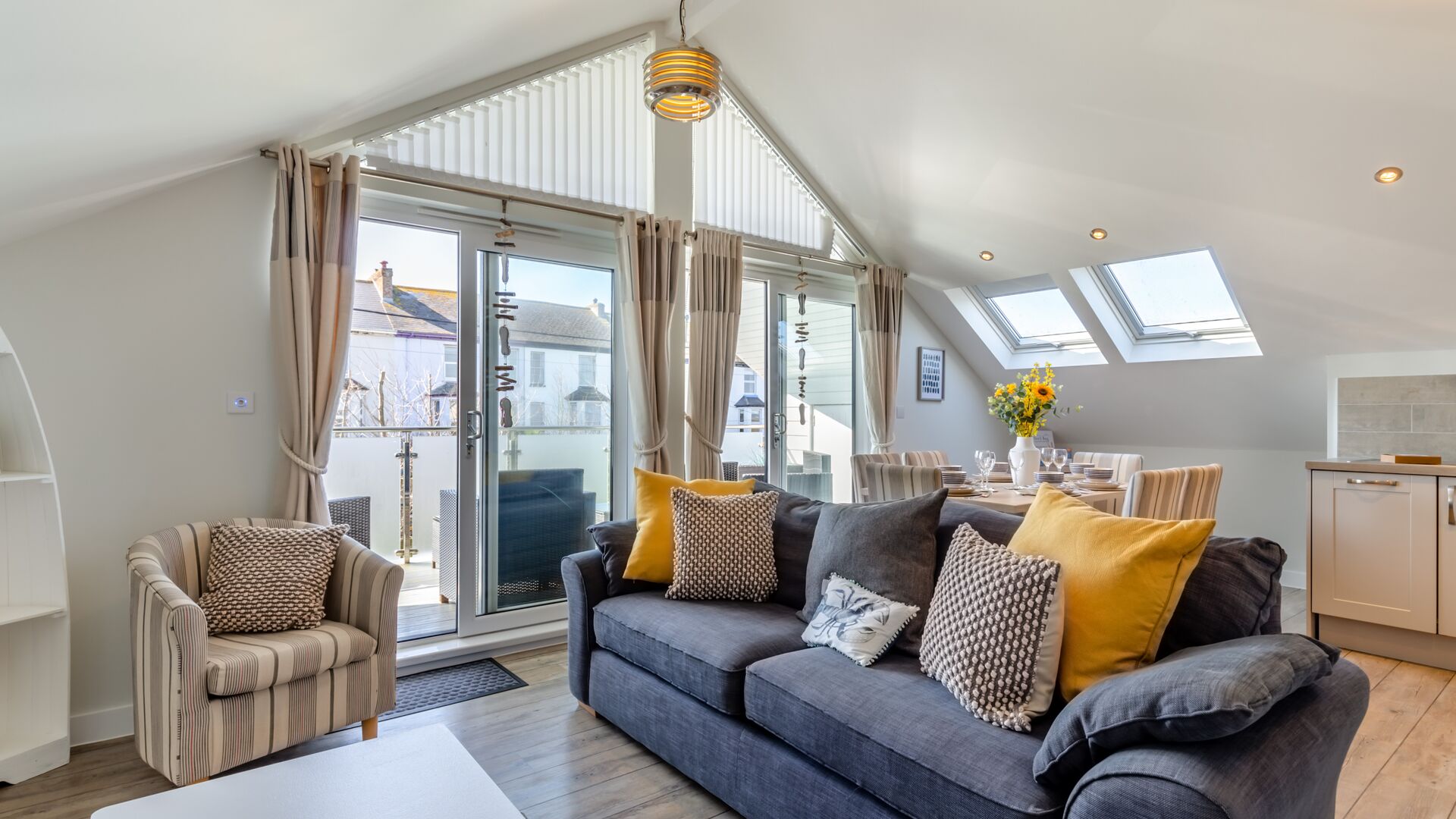 lounge with large windows in the Beachcomber apartment