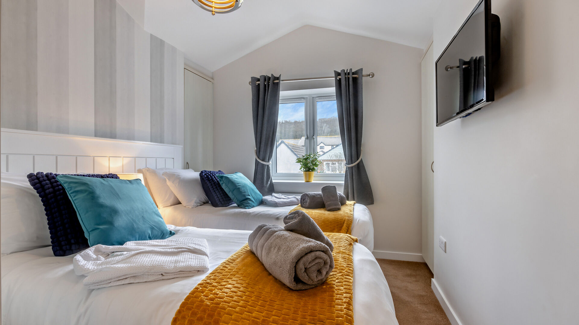 luxury twin bedroom at the Breakwater Apartment