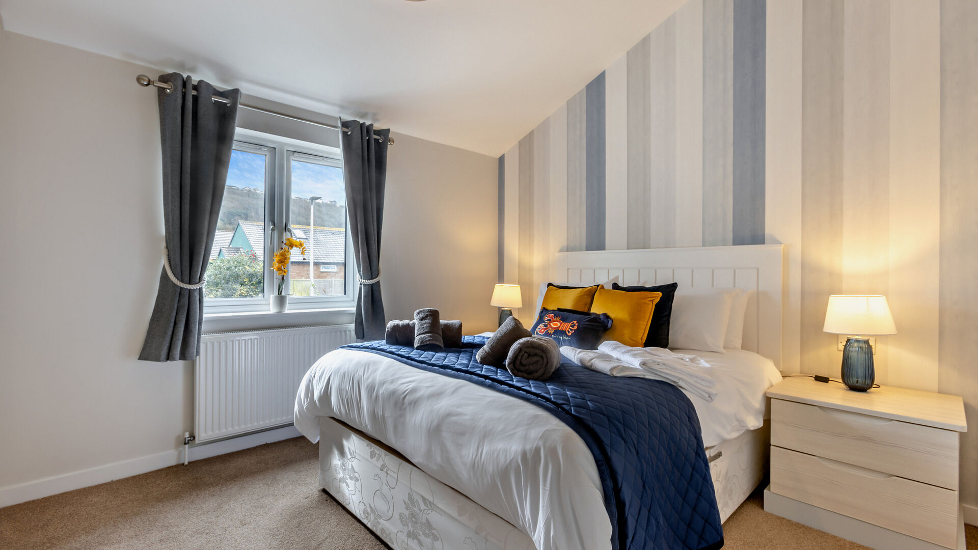 luxury master bedroom at the Breakwater Apartment