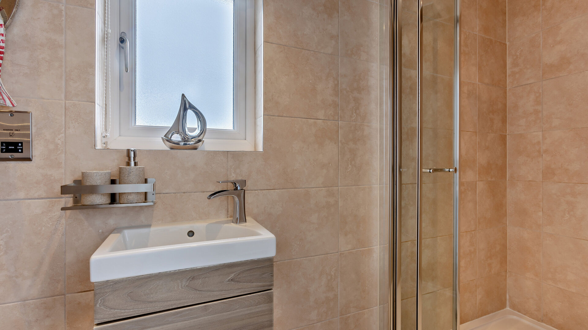 ensuite bathroom at the waterfront apartment westward ho