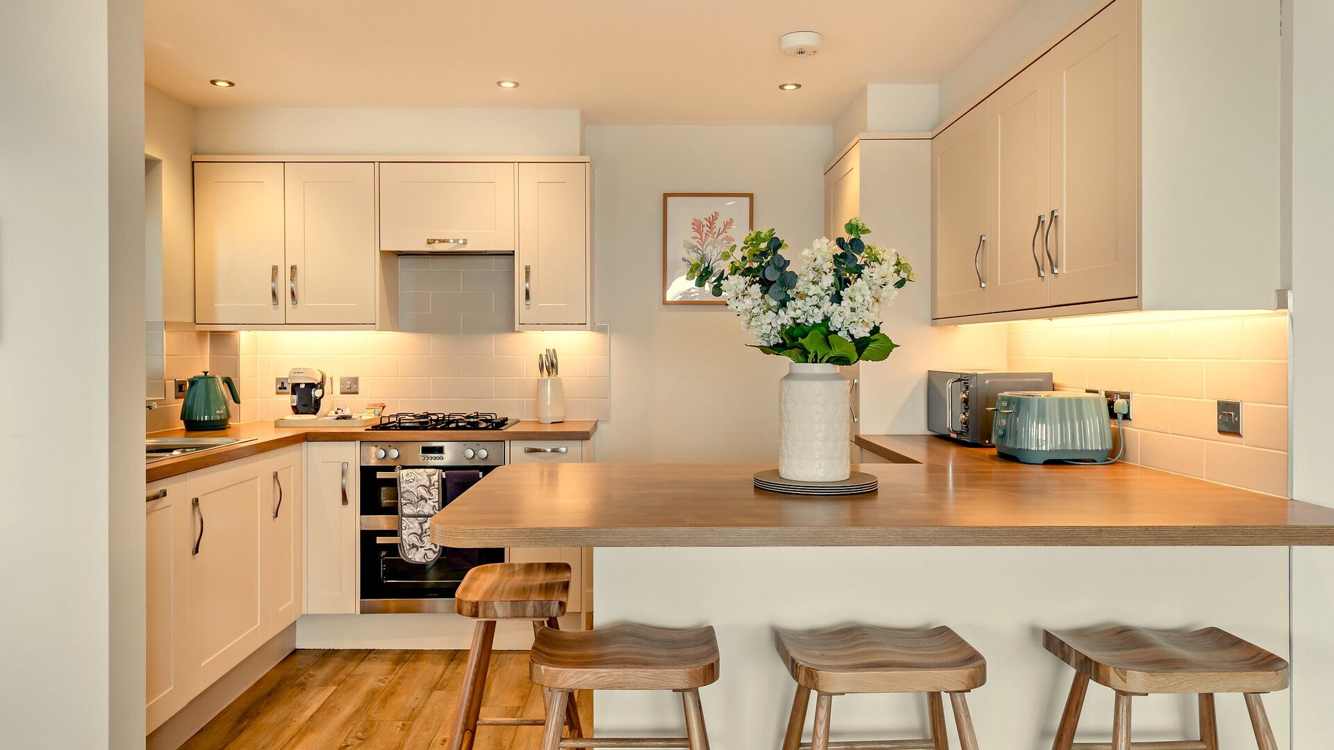 kitchen with breakfast bar at Waters edge apartment